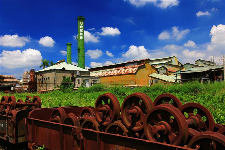 台糖虎尾糖廠透過燃燒蔗渣汽電共生，取得生質能再生能源憑證。